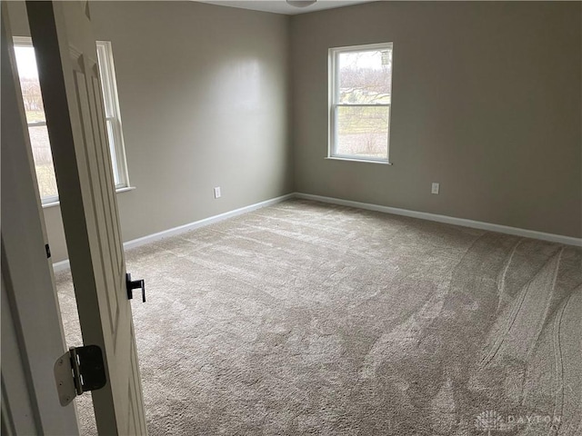 3348 Phillipsburg Union Rd, Englewood, OH 45322 - spare room with carpet and baseboards