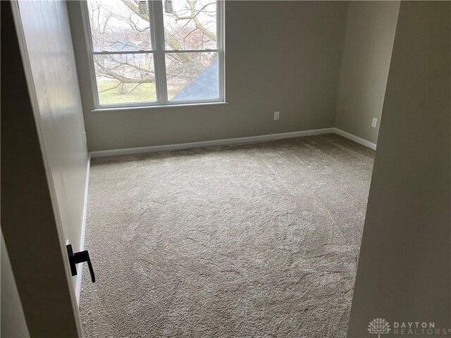 3348 Phillipsburg Union Rd, Englewood, OH 45322 - carpeted empty room with baseboards