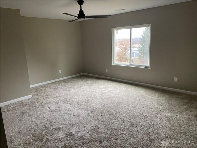 3348 Phillipsburg Union Rd, Englewood, OH 45322 - spare room with ceiling fan and carpet floors
