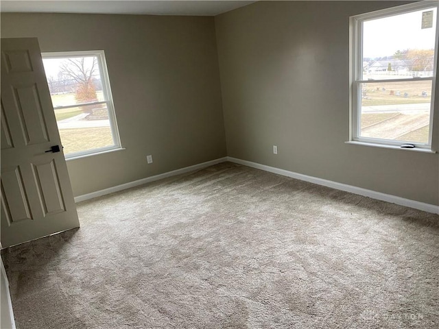 3348 Phillipsburg Union Rd, Englewood, OH 45322 - carpeted spare room featuring plenty of natural light