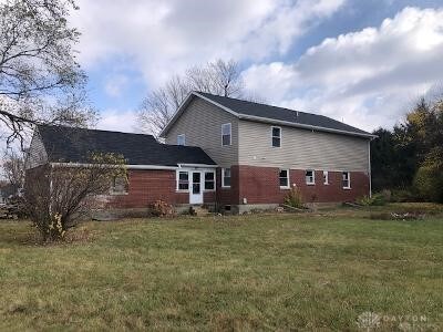 3348 Phillipsburg Union Rd, Englewood, OH 45322 - back of house featuring a yard
