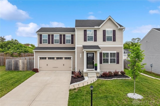 1918 Bessie Ave, Moraine, OH 45439 - traditional-style home with a garage, driveway, and roof with shingles