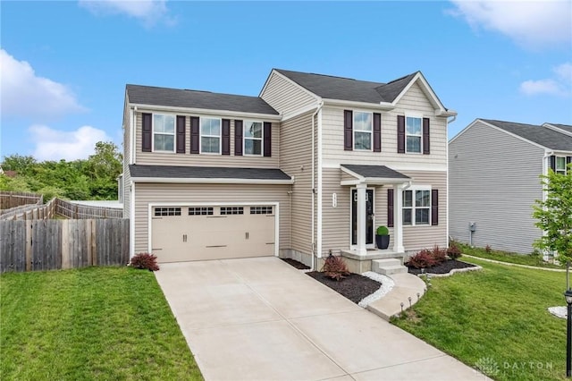 1918 Bessie Ave, Moraine, OH 45439 - traditional-style home featuring a garage and concrete driveway