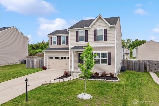 1918 Bessie Ave, Moraine, OH 45439 - traditional-style home with driveway, an attached garage, and a shingled roof