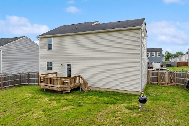 1918 Bessie Ave, Moraine, OH 45439 - rear view of house with a deck, a fenced backyard, and a gate