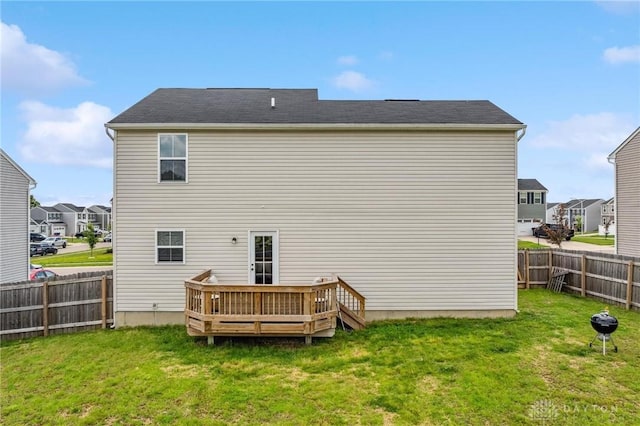 1918 Bessie Ave, Moraine, OH 45439 - back of house with a deck, a fenced backyard, and a residential view
