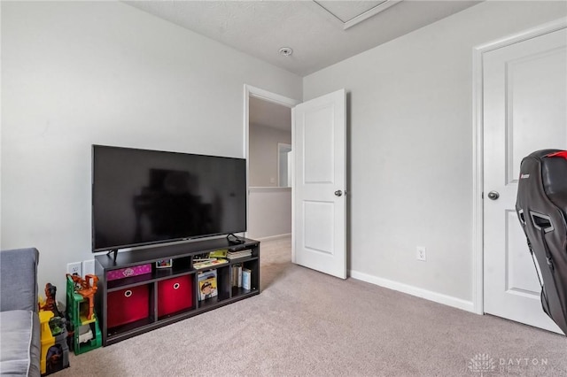 1918 Bessie Ave, Moraine, OH 45439 - carpeted living area with baseboards and attic access