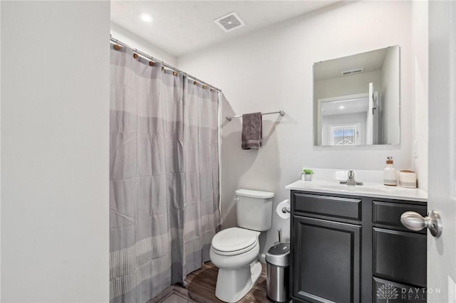 1918 Bessie Ave, Moraine, OH 45439 - bathroom featuring vanity, wood finished floors, and a shower with shower curtain