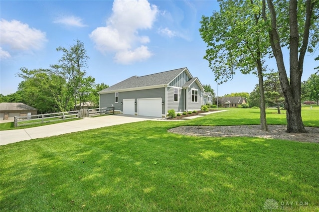 1584 Heritage Run Dr, Lebanon, OH 45036 - view of side of home with board and batten siding, driveway, and a garage