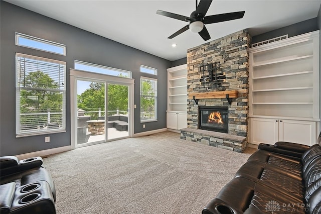 1584 Heritage Run Dr, Lebanon, OH 45036 - carpeted living area with ceiling fan, a stone fireplace, and recessed lighting