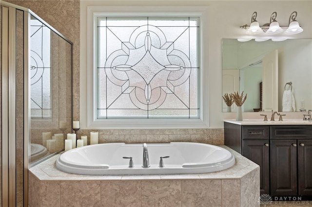 4738 Saddletop Ridge Ln, Mason, OH 45040 - bathroom featuring a bath, vanity, and plenty of natural light