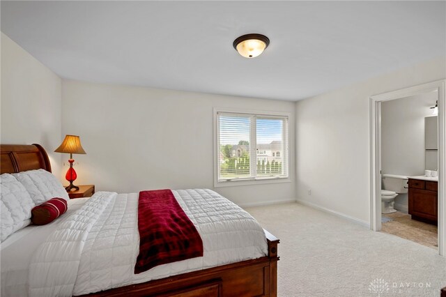 4738 Saddletop Ridge Ln, Mason, OH 45040 - bedroom featuring light carpet and ensuite bath