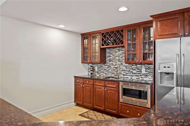 4738 Saddletop Ridge Ln, Mason, OH 45040 - indoor wet bar with stainless steel appliances, tasteful backsplash, and recessed lighting