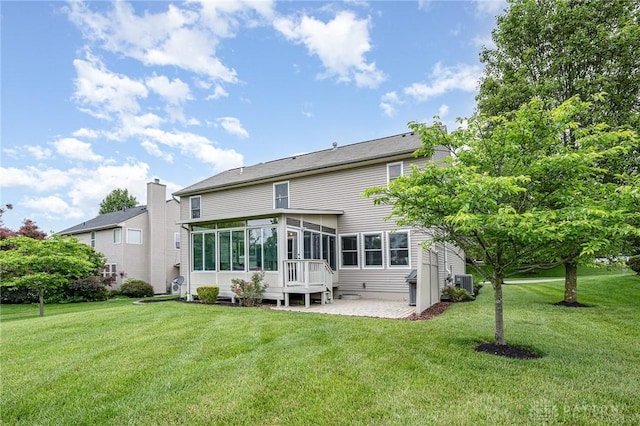 4395 Turtledove Way, Miamisburg, OH 45342 - rear view of property with a sunroom, a yard, and a patio
