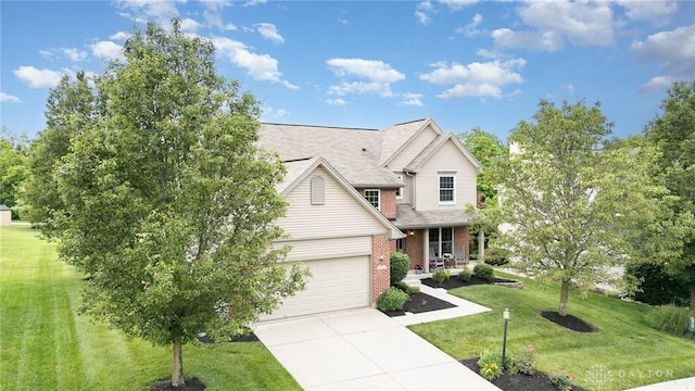 4395 Turtledove Way, Miamisburg, OH 45342 - traditional home with concrete driveway, a front lawn, brick siding, roof with shingles, and covered porch