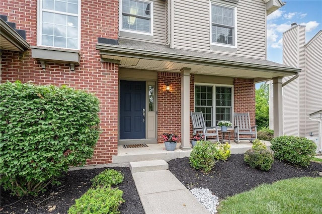 4395 Turtledove Way, Miamisburg, OH 45342 - entrance to property featuring a porch and brick siding