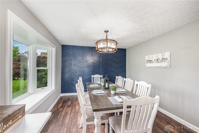 4395 Turtledove Way, Miamisburg, OH 45342 - dining room with a chandelier, wood finished floors, and a textured ceiling