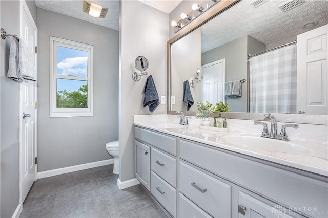 4395 Turtledove Way, Miamisburg, OH 45342 - full bath with double vanity and a textured ceiling