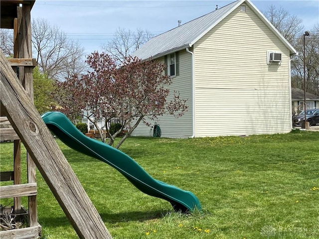 125 E Market St, Springboro, OH 45066 - view of play area with a yard and a wall mounted air conditioner