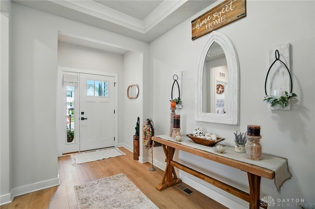 181 Cresting Rd, Fairborn, OH 45324 - entryway with light wood finished floors and a tray ceiling