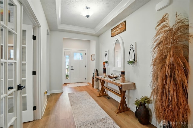 181 Cresting Rd, Fairborn, OH 45324 - entrance foyer featuring a tray ceiling, light wood-type flooring, and french doors