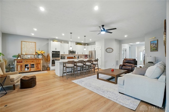 181 Cresting Rd, Fairborn, OH 45324 - living area with recessed lighting, a ceiling fan, and light wood-style flooring