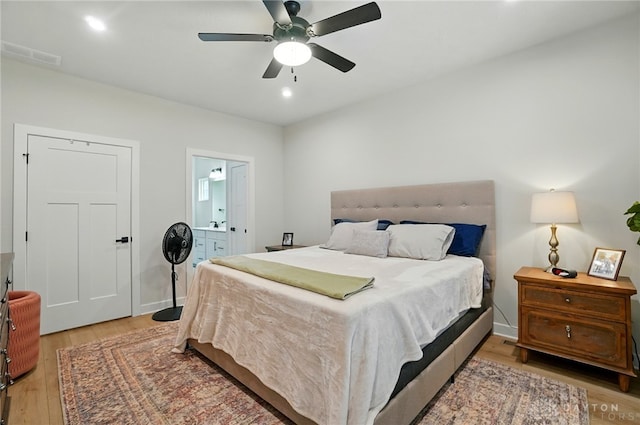 181 Cresting Rd, Fairborn, OH 45324 - bedroom featuring light wood-type flooring, connected bathroom, recessed lighting, and a ceiling fan