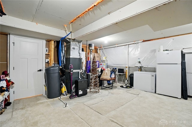 181 Cresting Rd, Fairborn, OH 45324 - unfinished basement featuring freestanding refrigerator and fridge