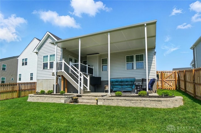 181 Cresting Rd, Fairborn, OH 45324 - rear view of house with a fenced backyard and stairs