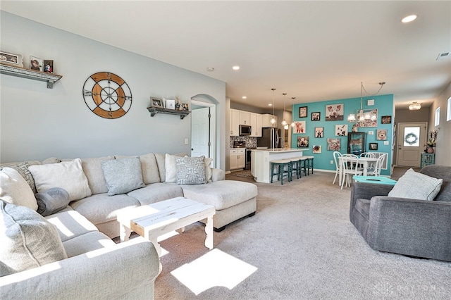 928 Southline Dr, Lebanon, OH 45036 - living area with a chandelier, light colored carpet, and recessed lighting
