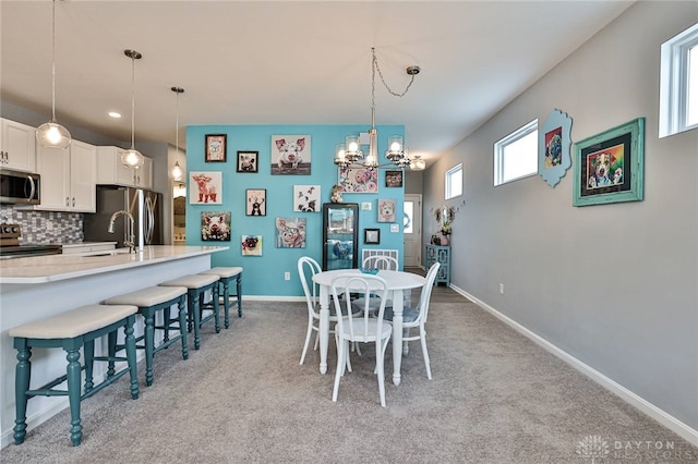928 Southline Dr, Lebanon, OH 45036 - dining space featuring a chandelier, light colored carpet, and recessed lighting