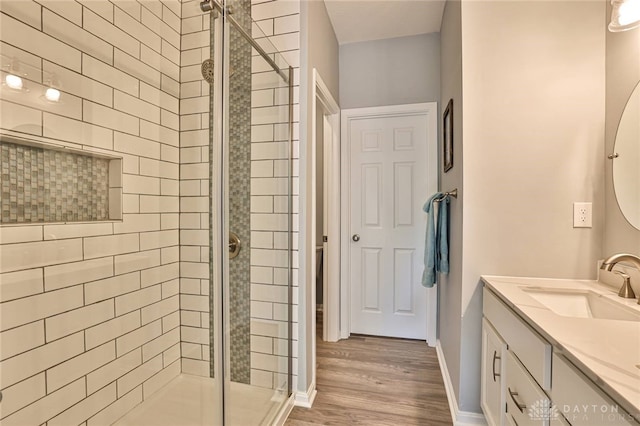928 Southline Dr, Lebanon, OH 45036 - full bath with a shower stall, vanity, and wood finished floors