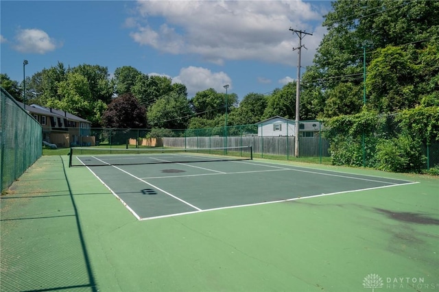 2823 Red Lion Ct, Centerville, OH 45440 - view of tennis court with community basketball court and view of scattered trees