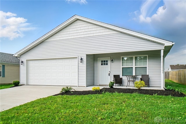 720 Diamond Loop, Middletown, OH 45044 - view of front of home featuring covered porch, driveway, and an attached garage