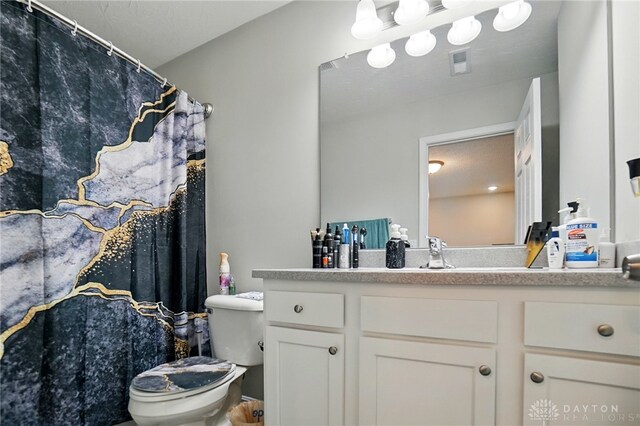 720 Diamond Loop, Middletown, OH 45044 - bathroom featuring toilet and vanity