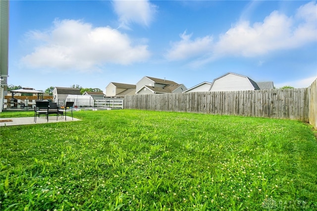 720 Diamond Loop, Middletown, OH 45044 - fenced backyard featuring a patio