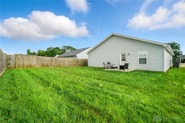 720 Diamond Loop, Middletown, OH 45044 - rear view of house with a fenced backyard