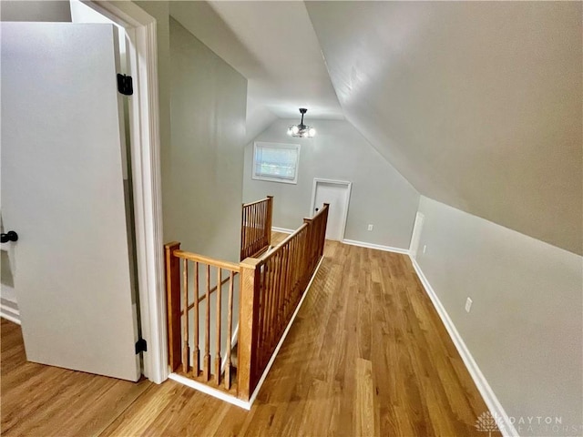 1601 Forrer Blvd, Kettering, OH 45420 - additional living space featuring wood finished floors and vaulted ceiling