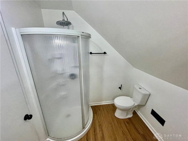 1601 Forrer Blvd, Kettering, OH 45420 - bathroom with a shower stall, wood finished floors, and vaulted ceiling