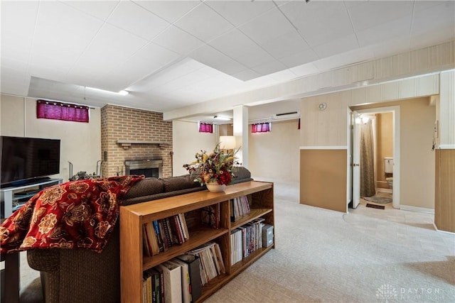 3611 Delaine Ave, Kettering, OH 45429 - carpeted living room with a brick fireplace