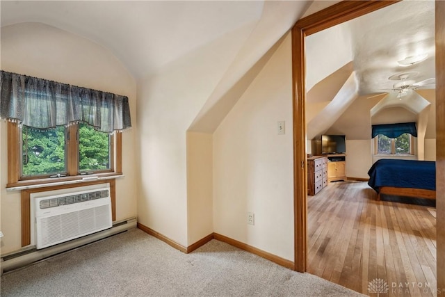 3611 Delaine Ave, Kettering, OH 45429 - bonus room with lofted ceiling, ceiling fan, hardwood / wood-style flooring, and a wall unit AC