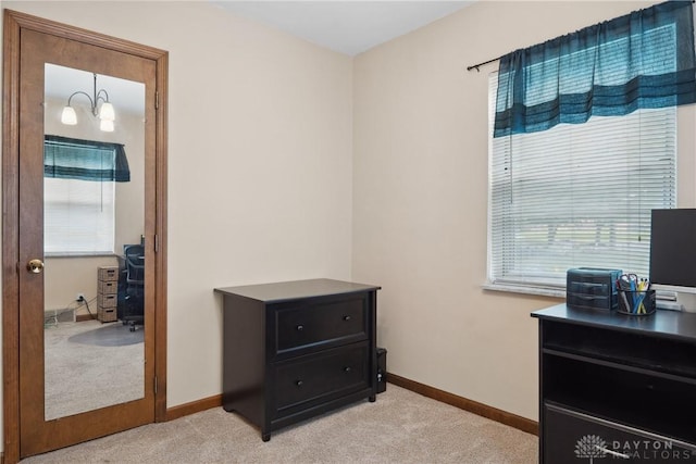 3611 Delaine Ave, Kettering, OH 45429 - bedroom with light colored carpet, multiple windows, and a desk