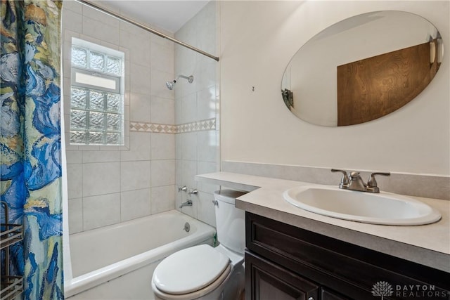 3611 Delaine Ave, Kettering, OH 45429 - bathroom featuring shower / bath combo with shower curtain and vanity