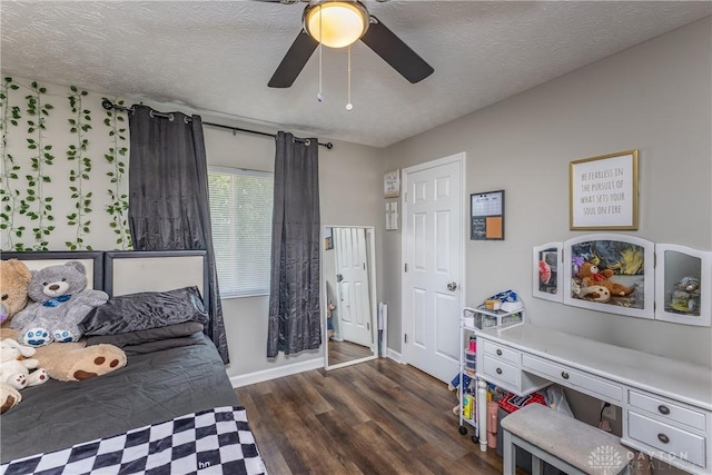 1107 Sunset Dr, Englewood, OH 45322 - bedroom featuring dark wood finished floors and a ceiling fan