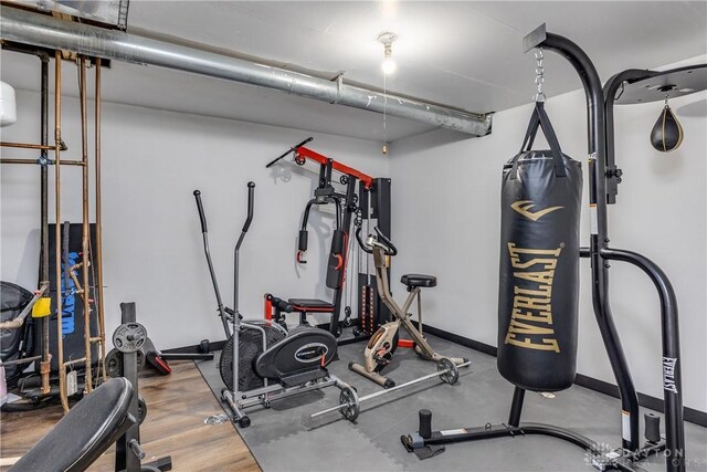 1107 Sunset Dr, Englewood, OH 45322 - exercise room featuring baseboards
