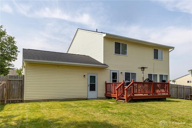 1107 Sunset Dr, Englewood, OH 45322 - back of property with a fenced backyard and a deck