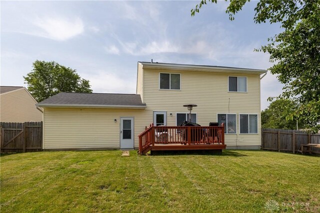 1107 Sunset Dr, Englewood, OH 45322 - back of house with a deck and a fenced backyard