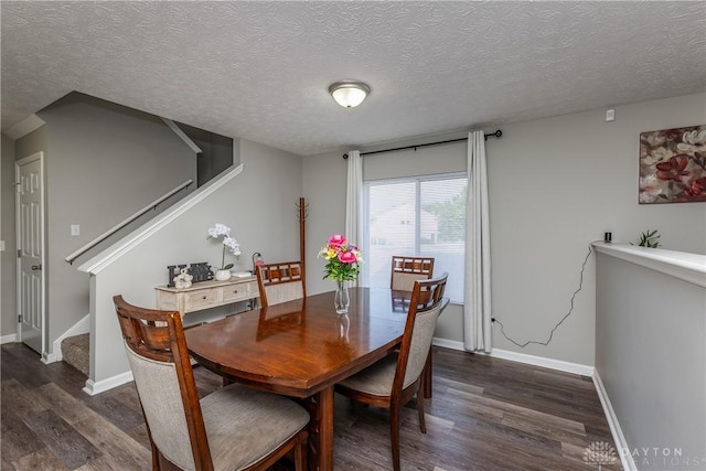 1107 Sunset Dr, Englewood, OH 45322 - dining room with dark wood-style floors, stairway, and a textured ceiling