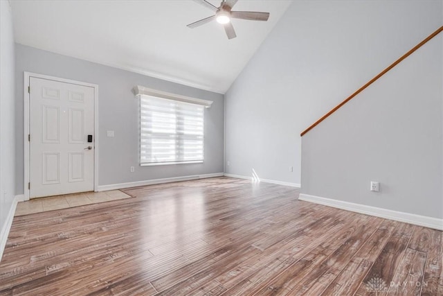 113 Village Trail Dr Unit 6, Vandalia, OH 45377 - unfurnished living room featuring a ceiling fan, lofted ceiling, and wood finished floors