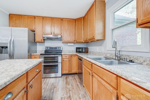 113 Village Trail Dr Unit 6, Vandalia, OH 45377 - kitchen with stainless steel appliances, under cabinet range hood, light countertops, and light wood-style floors